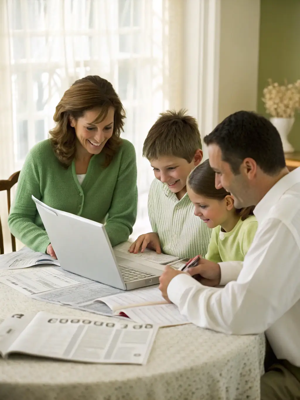 A concerned family looking at medical bills, representing a medical emergency loan, in a softly lit home environment.